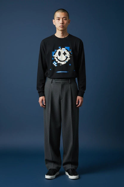 ODD COMMON black long-sleeve t-shirt featuring a blue and white glitchy pixelated smiley face graphic